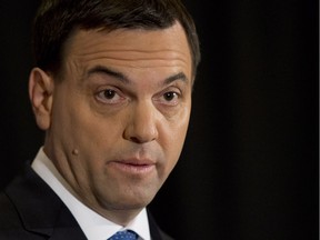 Ontario PC leader Tim Hudak speaks with the media in Ottawa on Thursday. Half way through the election campaign he looks to be running out of things to say.