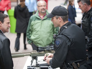 The Ottawa Police Service celebrate Police Week with "Community Day" to showcase various Ottawa Police sections such as Marine, Dive and Trails (MDT), District Traffic (motorcycle demonstration), Foot Patrol/Bicycle along Sparks Street Tuesday May 13, 2014.