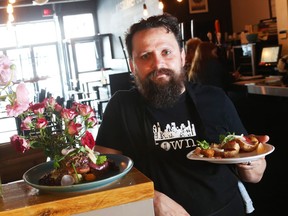 Town's owner/chef Marc Doiron with a tuna appetizer and a pork main course.