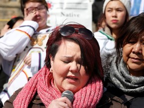 OTTAWA, ON. MARCH 5, 2014 --- A tear rolls down Holly Jarrett's cheek as she talked about her cousin, Loretta Saunders, at the vigil. About 200 people came out to Parliament Hill Wednesday for a vigil honouring Loretta Saunders and other missing and murdered indigenous women