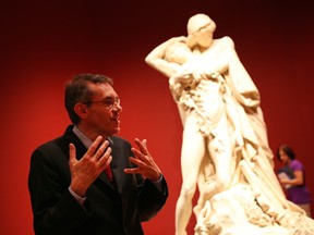 Co-curator Paul Lang with the Gustav Doré's sculpture Fame Stifling Genius, in Master of Imagination at the National Gallery. (Cole Burston, Ottawa Citizen)