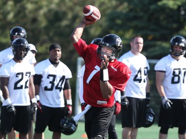 Henry Burris throws during the opening day of the Ottawa RedBlacks training camp, June 01, 2014.