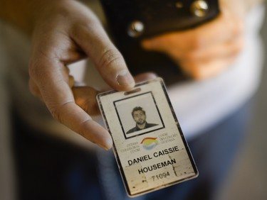 Daniel Caissier shows his employee pass card which have been deactivated at the Ottawa Convention Centre on Sunday, June 1, 2014. Caissie and St-Amour are employees at the Ottawa Convention Centre but have been banned for refusing to cover up their tattoos.