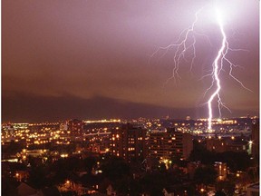 A file photo shows a storm over Ottawa. The dump of rain on Tuesday in the capital led to road closures.