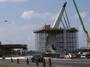 The City of Ottawa is suing the builder of the troubled pedestrian bridge over the Airport Parkway.