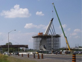 The Airport Parkway pedestrian bridge is now being completed by engineering firm Delcan and is due to be completed by the end of 2014, three years later than its original completion date and $4.7 million over its $6.5-million budget.