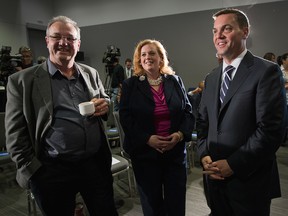 Randy Hillier (L) and Tory leader Tim Hudak (R) the day the last provincial election was called, with fellow MPP Lisa MacLeod. 
Wayne Cuddington/ Ottawa Citizen