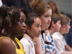 Some of Monday's recipients of the city's 911 Children's Acchievement Awards: from left: Shadia Bahati, Sandy Meas, Kate Chacksfield, Francis Demers and Nathan Lewandowski.