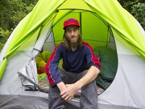 Luc Deschenes, 36 is one of several residents of a tent city in Gatineau Qc near the Robert Guertin Arena. The city is considering removing the campers but Luc Villemaire director of Le Gite Ami says there are too few spaces in local shelters to properly provide services. (Pat McGrath / Ottawa Citizen)