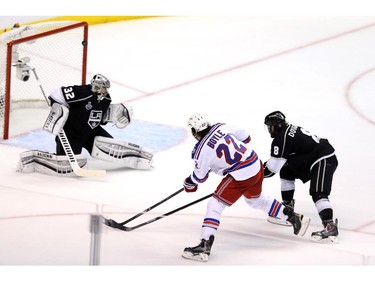 LOS ANGELES, CA - JUNE 13:  Brian Boyle #22 of the New York Rangers scores a second period goal past goaltender Jonathan Quick #32 of the Los Angeles Kings during Game Five of the 2014 Stanley Cup Final at Staples Center on June 13, 2014 in Los Angeles, California.