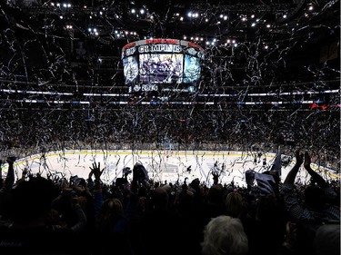 Confetti falls as the Los Angeles Kings celebrate defeating the New York Rangers 3-2 in double overtime of Game Five to win the 2014 Stanley Cup Final at Staples Center on June 13, 2014 in Los Angeles, California.