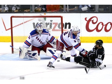 LOS ANGELES, CA - JUNE 13:  Marian Gaborik #12 of the Los Angeles Kings shoots the puck against Henrik Lundqvist #30 of the New York Rangers in the third period during Game Five of the 2014 Stanley Cup Final at Staples Center on June 13, 2014 in Los Angeles, California.