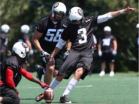 #3 Brett Maher practices his kick during the Redblack's practice in Ottawa, June 26, 2014 at Keith Harris Stadium, Carleton University. (Jean Levac / Ottawa Citizen) ORG XMIT: 0627 redblacks