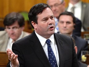Minister of Employment and Minister of Multiculturalism Jason Kenney responds to a question during question period in the House of Commons on Parliament Hill in Ottawa on May 15, 2014.THE CANADIAN PRESS/Sean Kilpatrick ORG XMIT: OTTK306