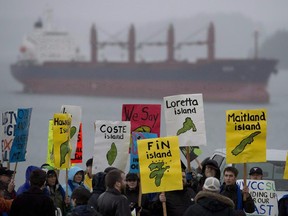 A group of protesters gathers outside the Northern Gateway hearings in Prince Rupert, B.C. on December, 10, 2012.