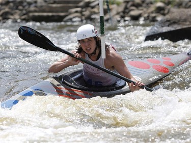 A kayaker competes at the first Ontario canoe slalom race of the year, at the Pumphouse downtown Ottawa on June 29, 2014. Many of these paddlers have hopes of representing Ontario at the PanAm games in 2015, while others are local recreational paddlers racing for the first time.