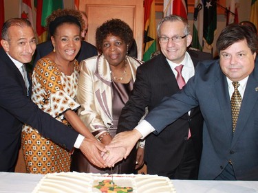 Africa Day took place at St. Elias Centre May 27. From left, Egyptian Ambassador Wael Aboulmagd, former governor general Michaelle Jean, Zimbabwean Ambassador Florence Chideya, Trade Minister Ed Fast, and Liberal MP Mauril Belanger cut the cake.