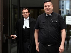 Gay activist Elliott Youden and his lawyer, Ian Carter, left, leave the Elgin Street courthouse on Wednesday after Youden was found not guilty of aggravated sexual assault.