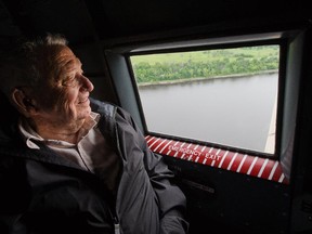 Angus Scott looks out the window as he and fellow Second World War fighter pilots Harry Hardy, Ken Hanna, and John Friedlander, were treated by the Canadian Aviation Museum to a flight on a Douglas DC-3, the twin-engined transport plane that flew paratroopers behind the Normandy beaches on D-Day.