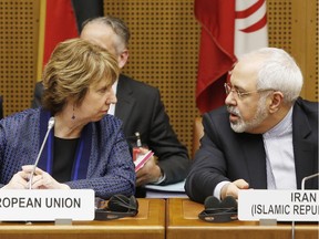 Vice President of the European Commission Catherine Margaret Ashton (L) and Iranian Foreign Minister Mohammad Javad Zarif attend the so called EU 5+1 Talks with Iran at the UN headquarters in Vienna, on June 17, 2014.
