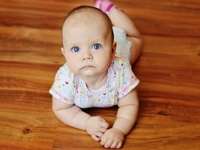 Justin Trudeau says that most families would get more per month from the Liberal benefit than under the Tory plan. This is a stock photo of a baby who, while exceedingly cute,  is probably not even Canadian and wouldn't qualify for the benefit, anyway.  So really this is just visual wallpaper. You should read the story below instead of this caption.