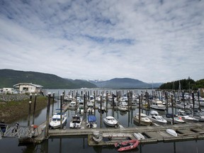 Boats sit in a harbour in Kitimat, B.C., Tuesday, June, 17, 2014. The Northern Gateway pipeline, once built, would bring oil from Alberta to Kitimat on the British Columbia coast to be loaded on tankers and shipped around the world.