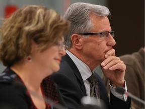 Coun. Diane Choiniere and Mayor Marcel Guibord, shown in this 2013 file photo, have been charged with breach of trust by a public officer.