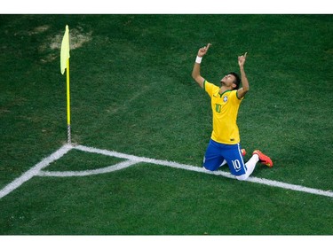 SAO PAULO, BRAZIL - JUNE 12:  Neymar of Brazil celebrates scoring his second goal on a penalty kick in the second half during the 2014 FIFA World Cup Brazil Group A match between Brazil and Croatia at Arena de Sao Paulo on June 12, 2014 in Sao Paulo, Brazil.