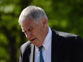 Bruce Carson, a former adviser to Prime Minister Stephen Harper, arrives for court in Ottawa on Monday for his preliminary hearing into charges of influence-peddling and prohibited lobbying.