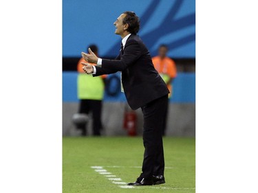 Italy's head coach Cesare Prandelli gestures from the touchline during the group D World Cup soccer match between England and Italy at the Arena da Amazonia in Manaus, Brazil, Saturday, June 14, 2014.