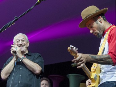 Charlie Musselwhite, left, performs with Ben Harper on the Main Stage at the Ottawa Jazz Festival on Friday, June 27, 2014.