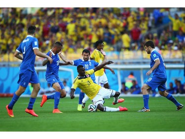 Jackson Martinez of Colombia falls to the ground during the 2014 FIFA World Cup Brazil Group C match between Colombia and Greece at Estadio Mineirao on June 14, 2014 in Belo Horizonte, Brazil.