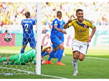 Teofilo Gutierrez of Colombia celebrates after scoring his teams second goal during the 2014 FIFA World Cup Brazil Group C match between Colombia and Greece at Estadio Mineirao on June 14, 2014 in Belo Horizonte, Brazil.