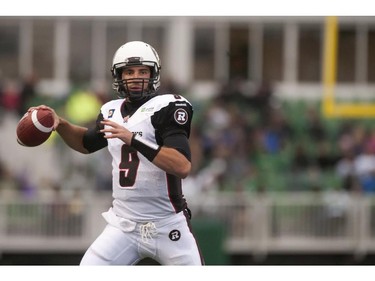 Ottawa Redblacks quarterback Danny O'Brien looks to make a pass against the Saskatchewan Roughriders during first half of CFL pre-season football action in Regina, Sask., Saturday, June 14, 2014.