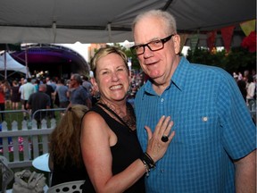 David Charles, a law partner at Kelly Santini, with his wife, Judy, at a reception hosted Friday, June 27, 2014, in the VIP tent during the TD Ottawa Jazz Festival.