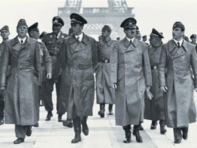 Detail from the cover of the book Disobeying Hitler by Randall Hansen. Adolf Hitler and his officers walk through Paris.