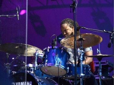 Drummer Louis Alvin Cato plays the drums as he performs with Bobby McFerrin performs on the Main Stage at Confederation Park during the Ottawa Jazz Festival in Ottawa on Sunday, June 29, 2014.