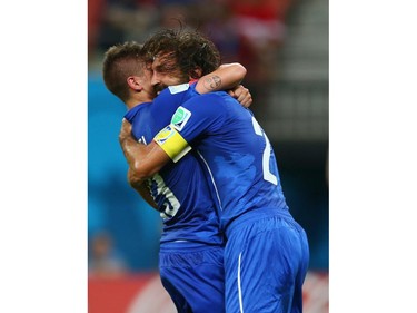 MANAUS, BRAZIL - JUNE 14:  Marco Verratti of Italy and Andrea Pirlo celebrate Italy's first goal during the 2014 FIFA World Cup Brazil Group D match between England and Italy at Arena Amazonia on June 14, 2014 in Manaus, Brazil.