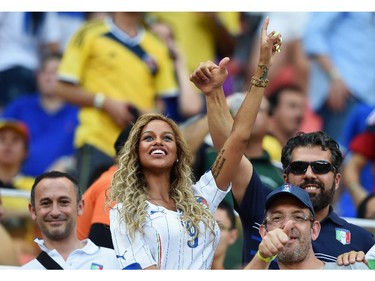 Fanny Neguesha, fiancee of Mario Balotelli of Italy, cheers in the crowd during the 2014 FIFA World Cup Brazil Group D match between England and Italy at Arena Amazonia on June 14, 2014 in Manaus, Brazil.