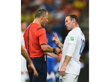 MANAUS, BRAZIL - JUNE 14:  Wayne Rooney of England reacts toward referee Bjorn Kuipers during the 2014 FIFA World Cup Brazil Group D match between England and Italy at Arena Amazonia on June 14, 2014 in Manaus, Brazil.