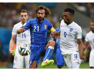 MANAUS, BRAZIL - JUNE 14: Andrea Pirlo of Italy controls the ball against Daniel Sturridge of England during the 2014 FIFA World Cup Brazil Group D match between England and Italy at Arena Amazonia on June 14, 2014 in Manaus, Brazil.