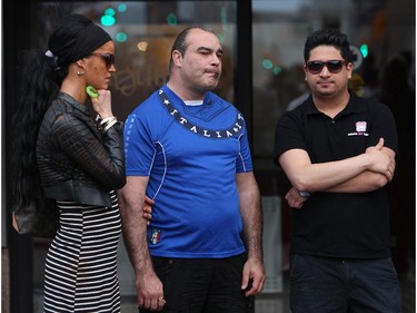 Father of murdered teen Brandon Volpi, Danny holds hack tears as Brandon's friends swap stories and mourn their classmate, friend, and family member at a vigil out front of Les Suites in Ottawa on Sunday, June 8, 2014.