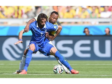 Colombia's defender Juan Camilo Zuniga (R) vies with Greece's forward Georgios Samaras (L) during a Group C football match between Colombia and Greece at the Mineirao Arena in Belo Horizonte during the 2014 FIFA World Cup on June 14, 2014.