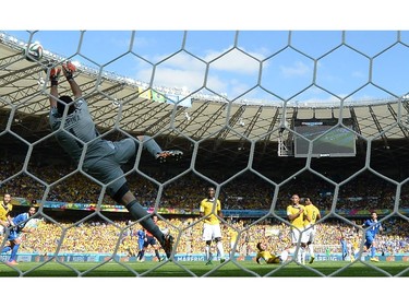 Colombia's goalkeeper David Ospina jumps for a ball during a Group C football match between Colombia and Greece at the Mineirao Arena in Belo Horizonte during the 2014 FIFA World Cup on June 14, 2014.