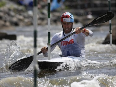 Former Canadian National Team paddler John Hastings competes in the Kayak (K1) Men's category at the first Ontario canoe slalom race of the year, at the Pumphouse downtown Ottawa on June 29, 2014. Many of these paddlers have hopes of representing Ontario at the PanAm games in 2015, while others are local recreational paddlers racing for the first time.