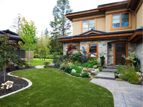 Replacing grass with artificial turf keeps the look of a lawn without the maintenance.