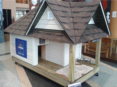 Minto's entry in the Homes with Woofs fundraiser. Billed as a miniature of the Bradford model, the 32-square-foot home weighs about 1,100 lbs.
