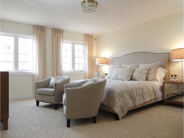 Master bedroom of the Oakwood townhome model by Glenview Homes at Monahan Landing. The home has been staged to appeal to downsizing boomers.