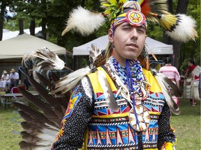 Gabriel Whiteduck, from Kitigan Zibi, Que., prepares to dance at the Summer Solstice Aboriginal Festival at the 2014Summer Solstice Aboriginal Festival. The event continues this year, and is free for all to attend.