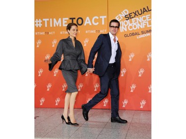 LONDON, ENGLAND - JUNE 13:  UN Special Envoy and actress Angelina Jolie and Actor Brad Pitt attend the Global Summit to End Sexual Violence in Conflict at ExCel on June 13, 2014 in London, England. The four-day conference on sexual violence in war is hosted by Foreign Secretary William Hague and UN Special Envoy and actress Angelina Jolie.